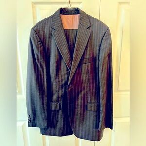 Hugo Boss, charcoal grey pinstripe suit.